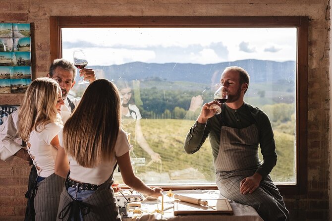 A Brunello Cooking Class with Vineyards View Winery - Rolling pasta in the panoramic terrace-kitchen