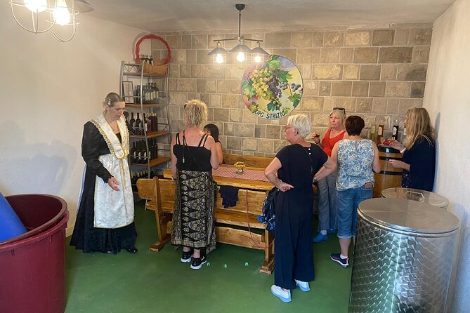 Family-run Vineyard Tour & Award Winning Wine Tasting/Delicacies - Walking Through the Vineyards and Olive Groves