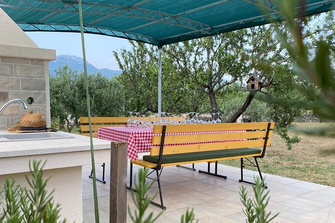 Family-run Vineyard Tour & Award Winning Wine Tasting/Delicacies - A Dalmatian Table Beneath the Almond Trees