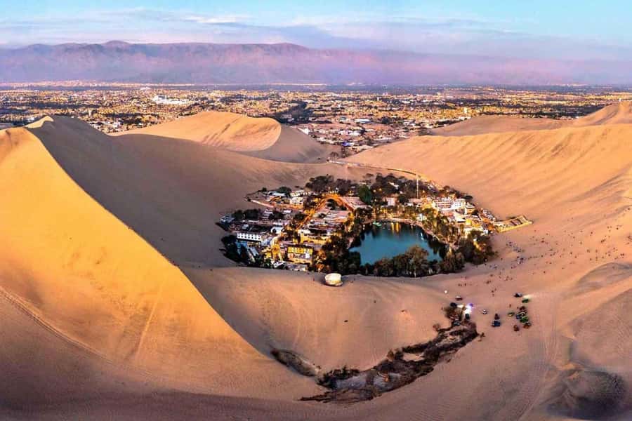 From Lima: Ballestas Islands, Huacachina and Wine Route Trip - Seeing El Candelabro from the water