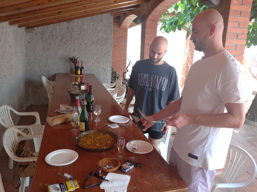 From Sitges: Paella Masterclass, Bike Ride and Winery Visit - Inside a winery with nine generations of family stories