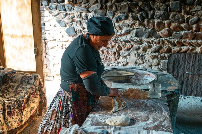 Kakheti Wine Tour and Discover Monasteries Vineyards Telavi - Badiauri turns bread into a hands-on lesson