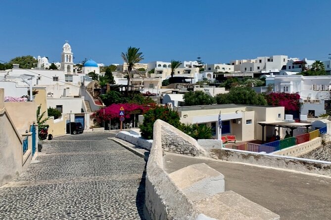 Santorini: Must-See & Winery Visit Private Tour - Red Beach shows the island’s volcanic side